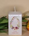 Easter candle with an egg and floral design